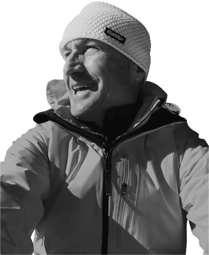 Emil Hofer laughing in ski jacket and beanie